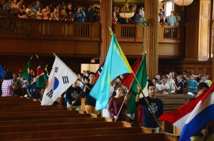 students carrying flags